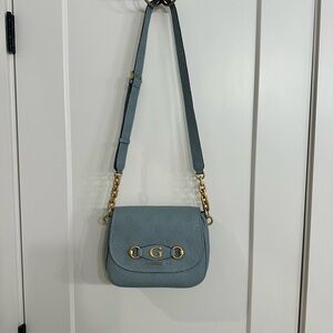 Chic Blue Crossbody Bag with Gold Accents